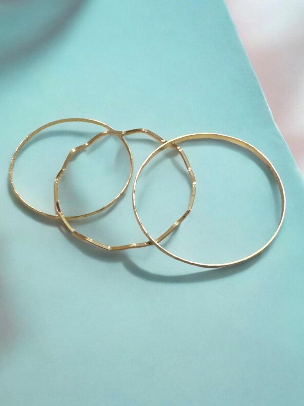 Set of Three Gold Bangle Bracelets
2083